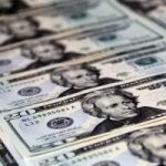 Em dia de cautela, dólar e bolsa oscilam antes de debate na Globo
