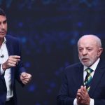 Lula expôs Flávio em casos de corrupção, e senador acertou ao deixar petista 'visivelmente irritado', avaliam aliados