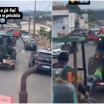Vídeo mostra homem levando jato de água em trator durante carreata de apoiadores de Flávio Bolsonaro em MG: 'Vai ficar amarrado até segunda'